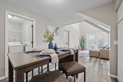 Charming 4-seater dining space perfect for enjoying meals with loved ones in a cozy and inviting setting.