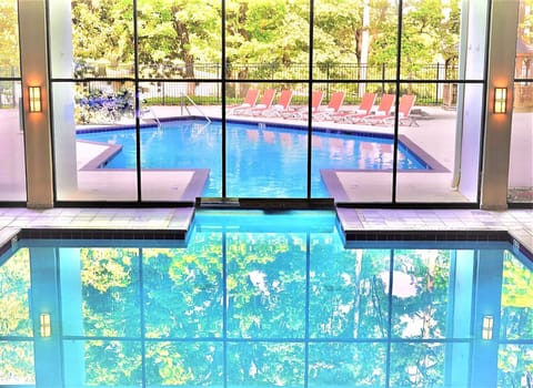 Indoor pool, seasonal outdoor pool, pool umbrellas, sun loungers