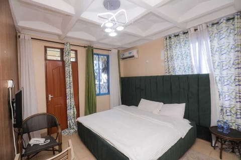Deluxe Studio Suite, Balcony, City View | Premium bedding, desk, laptop workspace, blackout drapes