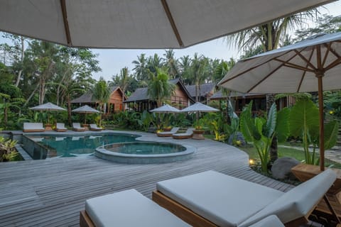 Outdoor pool, open 7:00 AM to 10:30 PM, pool umbrellas, sun loungers