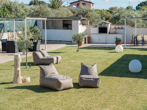 Plant, Property, Building, Sky, Shade, Land Lot, Tree, Architecture, Grass, Outdoor Furniture