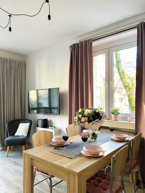 Deluxe Apartment, Balcony, Courtyard View | Living area | 165-cm flat-screen TV with satellite channels, TV, Netflix