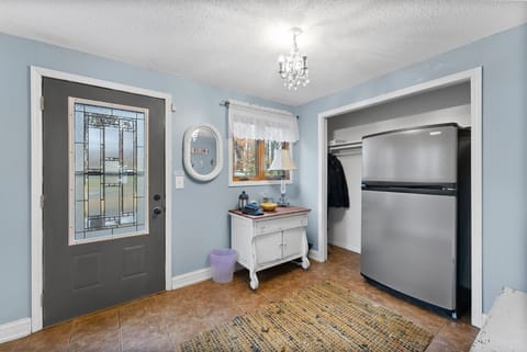 Cozy entryway features convenient key drop