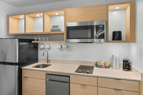 Studio, 2 Queen Beds | Private kitchen | Full-size fridge, microwave, stovetop, dishwasher