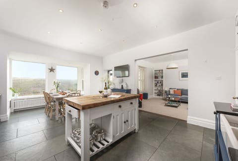 Henscath House, Mullion. Ground Floor: The large picture windows provide glorious garden and clifftop views