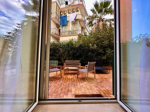 Exclusive Apartment, City View | Living area | Flat-screen TV