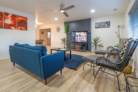 Living room with 65" TV, Netflix, electric fireplace to relax