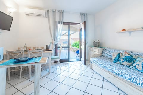 Family Apartment, 1 Bedroom, Microwave (Sandy Bear Guesthouse) | Living area | Flat-screen TV