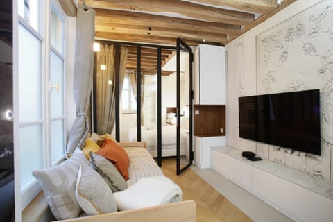 Apartment | Laptop workspace, iron/ironing board, bed sheets