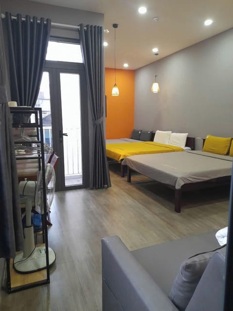 Family Triple Room, Balcony, City View | Blackout drapes, iron/ironing board, free WiFi