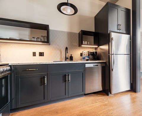 Fully equipped kitchen with modern appliances, offering everything you need for preparing meals or enjoying a morning coffee.