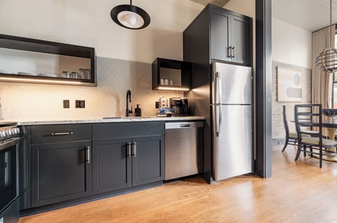 Fully equipped kitchen with modern appliances, offering everything you need for preparing meals or enjoying a morning coffee.