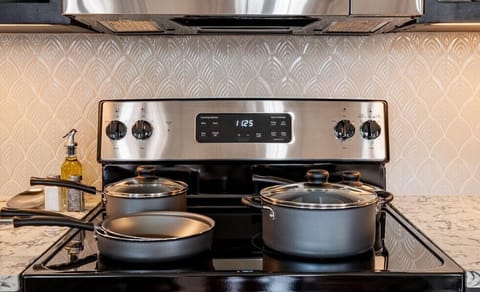 Kitchen essentials stocked in every suite.