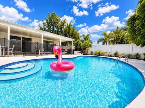 Make a splash with floaties and basketball hoops by the pool, perfect for endless fun and games.