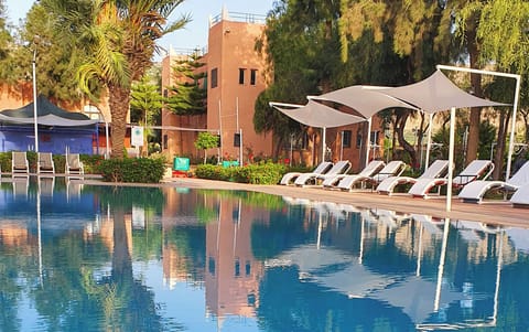 Outdoor pool, open 10:00 AM to 8:00 PM, sun loungers