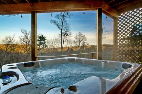Soak your troubles away in a private & covered hot tub!