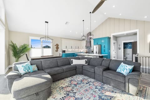 Natural light and high ceilings make the main living area bright and open
