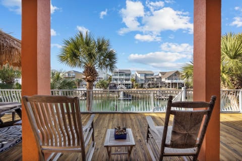 Relax with coffee, watch the boats glide by. A serene escape in every view.