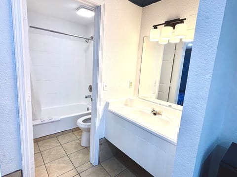 Double Room, 2 Queen Beds, Non Smoking | Bathroom | Towels, soap, shampoo, toilet paper