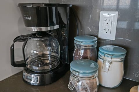 Drip coffee machine with ground coffee, sugar & tea included.