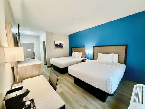 Room, 2 Queen Beds, Non Smoking | In-room safe, desk, blackout drapes, iron/ironing board