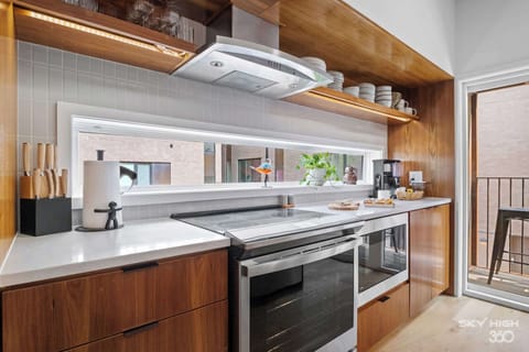 High end stove with range hood &. microwave. Fully stocked kitchen