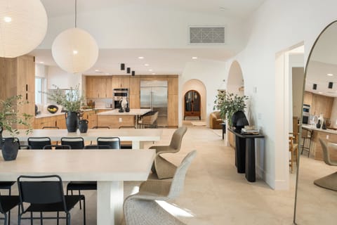 Two custom dining tables with seating for 20!