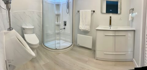 Deluxe Studio Suite, 1 Queen Bed, Garden View | Bathroom | Bathtub, hair dryer, slippers, heated floors