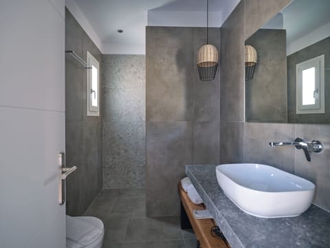 Double Room, Sea View | Bathroom | Shower, hair dryer, slippers, towels