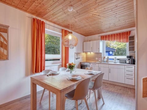 Table, Furniture, Property, Cabinetry, Wood, Countertop, Interior Design, Floor, Chair, Flooring