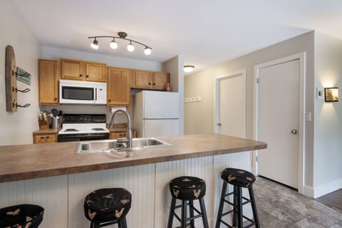 Bedroom and bathroom located just off kitchen hallway