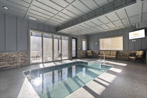 Heated indoor pool, private to your cabin—swim year-round without sharing with strangers. Big windows, warm water, and plenty of deck space for towels + snacks. Rainy day? Winter trip? Doesn’t matter. This is the feature that keeps vacation fun on-site.