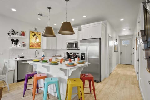 Enjoy breakfast at the counter, offering additional seating for 5