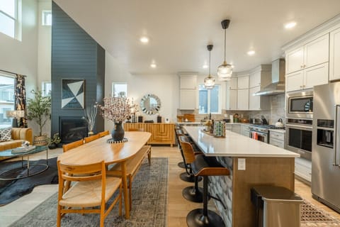 Open kitchen-dining layout perfect for group meals