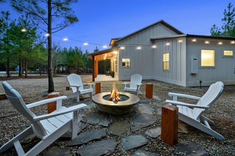 Firepit area with Adirondack chairs for s’mores and stargazing