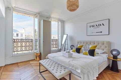 Apartment | Laptop workspace, iron/ironing board, bed sheets