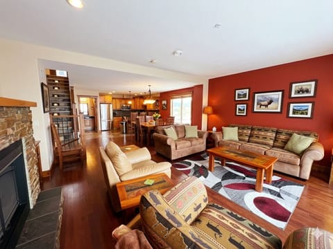 Cozy open plan living at its best. Gas Fireplace, comfortable seating, 65" Smart TV with Shaw Cable.