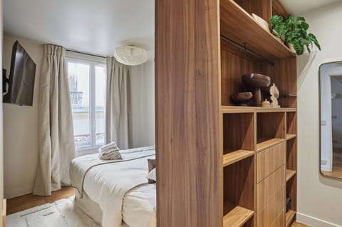 Apartment | Laptop workspace, iron/ironing board, bed sheets