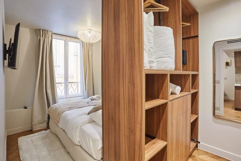 Apartment | Laptop workspace, iron/ironing board, bed sheets
