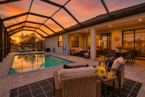Spacious lanai with private pool. Lanai also features a table top fire pit, outdoor kitchen, sun loungers and dining table that seats 6