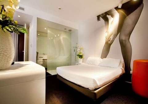 Deluxe Double Room, Garden Area | Minibar, in-room safe, desk, soundproofing