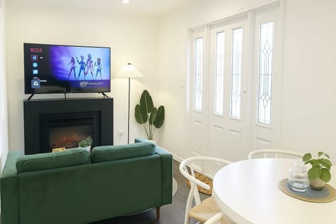 Living Room + Dining Area: TV, Fire Place, Dining Area, Lounge, AirCon