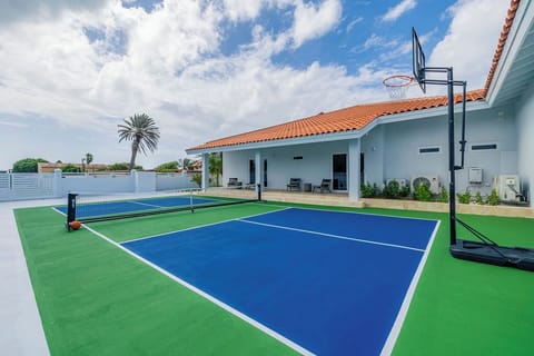 Escape to your own private paradise. This luxurious villa offers breathtaking views, excellent amenities, and a dedicated pickleball court. Perfect for families and friends, this idyllic retreat is your ultimate getaway destination.