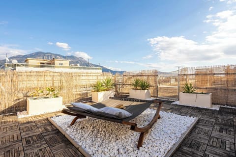 Relaxing Rooftop Terrace with Open Sky Views, Perfect for Sunsets and Evening Drinks

