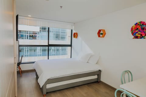 Cama, vista general de la suite 