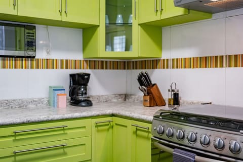 Kitchen stocked with essentials including coffee to kickstart your day.