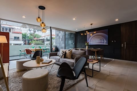 Chic living room with floor-to-ceiling windows for abundant natural light.