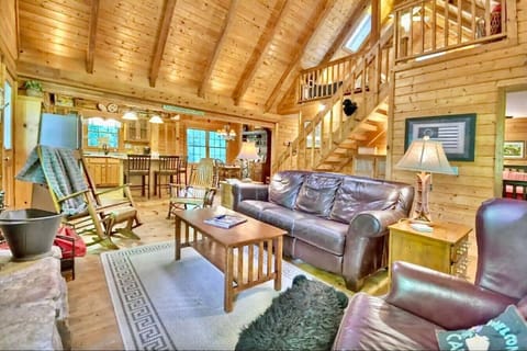 Cozy and warm main living area, stairs to the loft bedroom