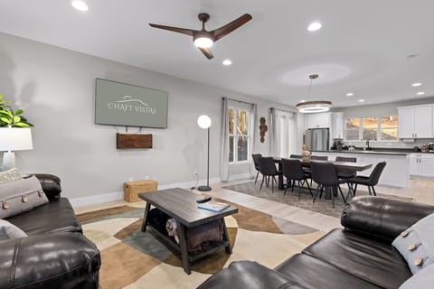 Open Concept Living Room with 65" 4K Flat Screen (1)