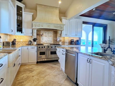 Cook with ease in a modern kitchen equipped for gourmet meals.